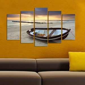 Viacdielny obraz Sunset Over The Sea And Boat 110x60 cm vyobraziť