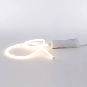 SELETTI Stolová LED lampa Daily Glow ako tuba zubnej pasty vyobraziť