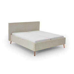 Krémová čalúnená dvojlôžková posteľ s úložným priestorom s roštom 180x200 cm Riva – Meise Möbel vyobraziť