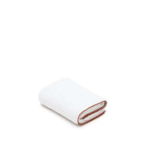 Biely froté bavlnený uterák 30x50 cm Sinami – Kave Home vyobraziť