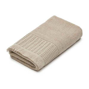 Béžový bavlnený uterák 50x90 cm Veta - Kave Home vyobraziť