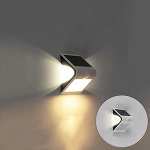 Vonkajšia nástenná lampa biela 14, 5 cm so stmievaním a senzorom na solárnom paneli - Daya vyobraziť