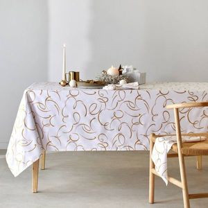 Obrus s potlačou zlatých špirál vyobraziť