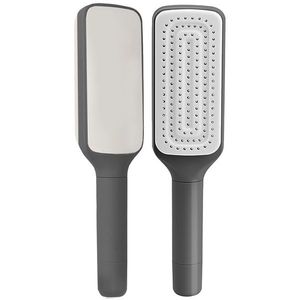 Samočistiaca kefa na vlasy vyobraziť