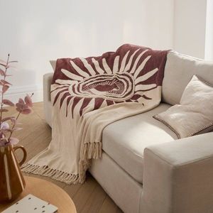 Plied s textúrovaným efektom a motívom slnka vyobraziť