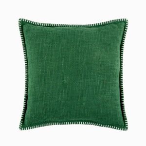 Jednofarebný vankúšik s textúrou zakončený ozdobným stehom vyobraziť